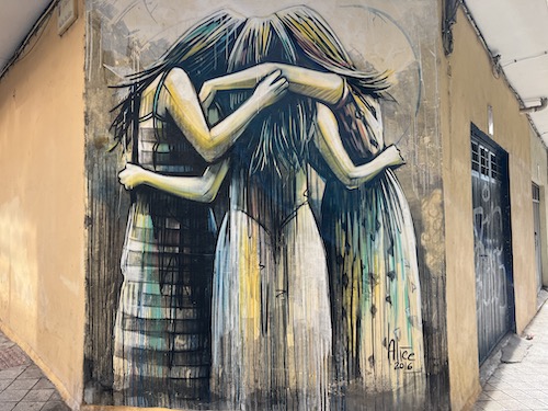 three girls hugging