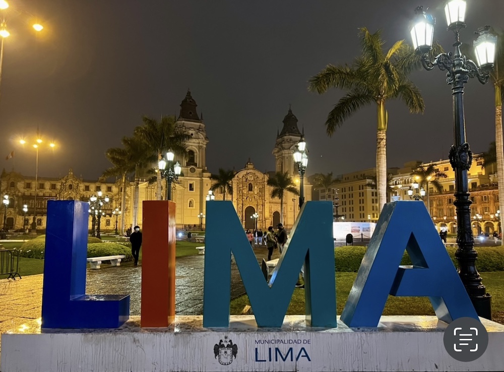 Lima sign in Playa Mayor at nighttime