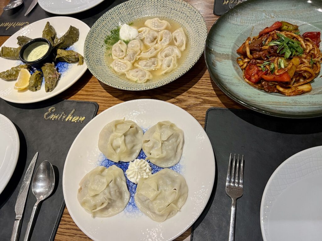 manti, grape leaf dolma, and lagman