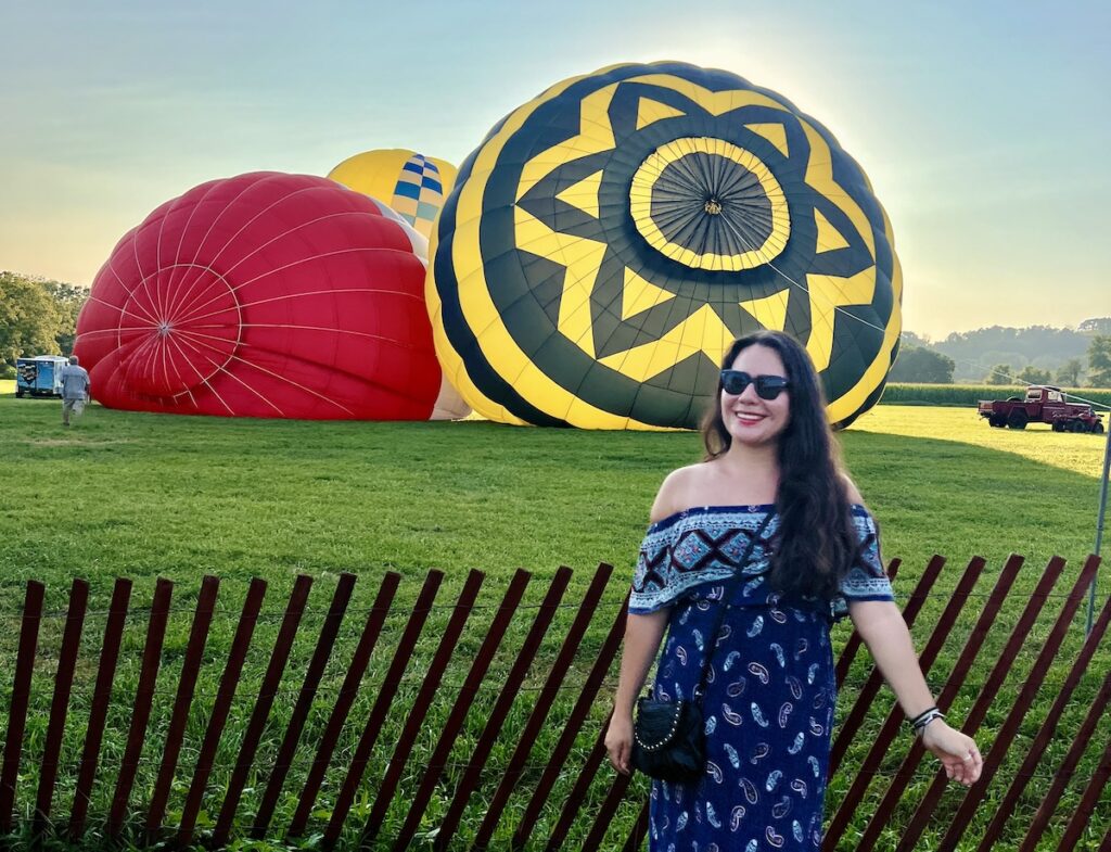 brunetter at NJ Balloon Festival with balloons getting ready to take off